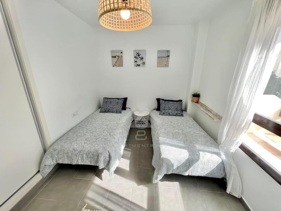 Łóżko lub łóżka w pokoju w obiekcie Oasis & Spa Apartment