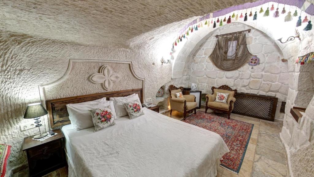 Postel nebo postele na pokoji v ubytování Roc Of Cappadocia