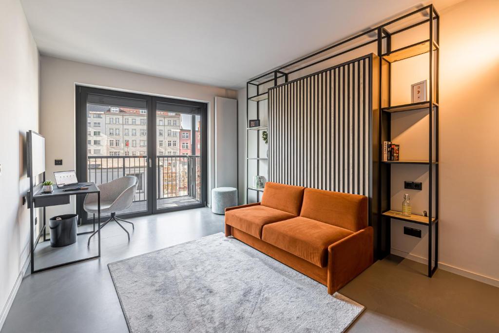 Posezení v ubytování YUMA Apartments Leipzig Berliner Straße