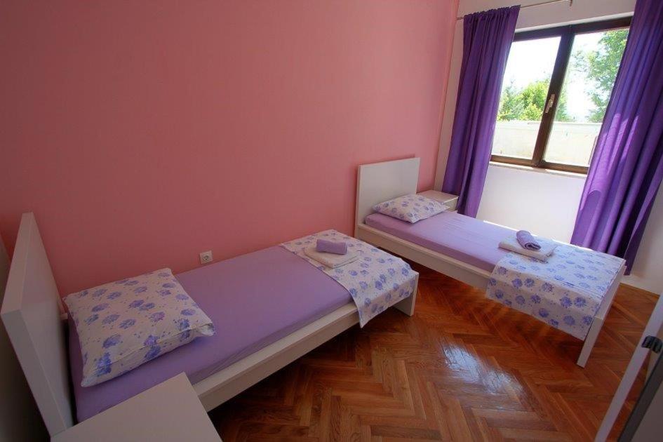 Posteľ alebo postele v izbe v ubytovaní Villa Vuka