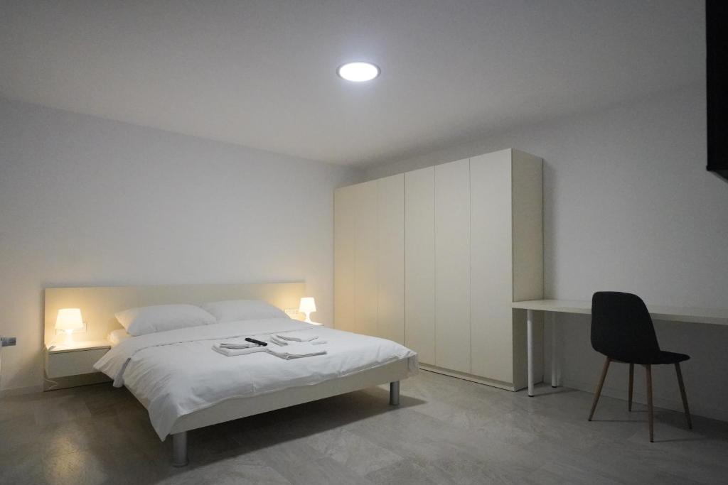 Postel nebo postele na pokoji v ubytování Apartments Choice