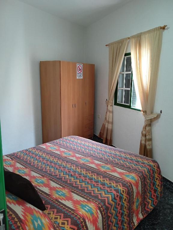 Posteľ alebo postele v izbe v ubytovaní Arenas del mar