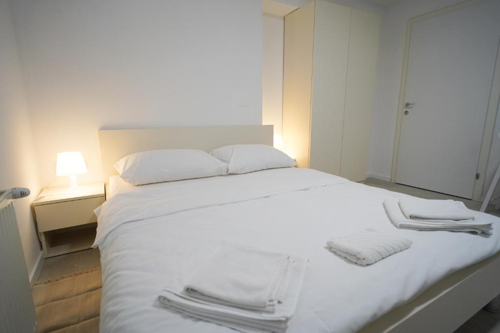 Postel nebo postele na pokoji v ubytování Apartments Choice
