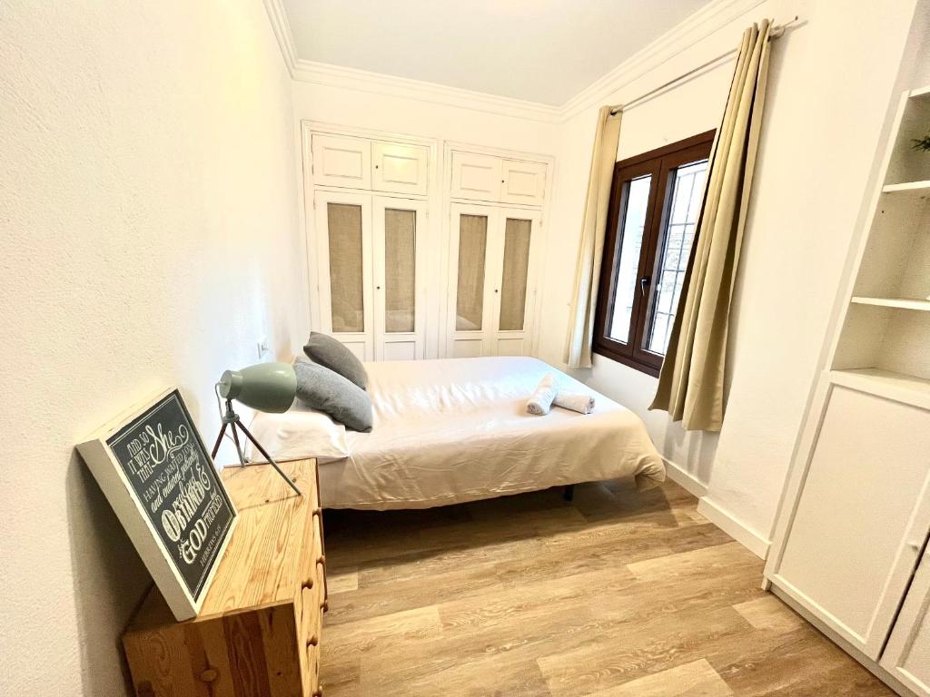 Posteľ alebo postele v izbe v ubytovaní Apartamento centro historico