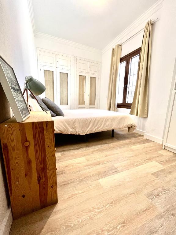 Posteľ alebo postele v izbe v ubytovaní Apartamento centro historico