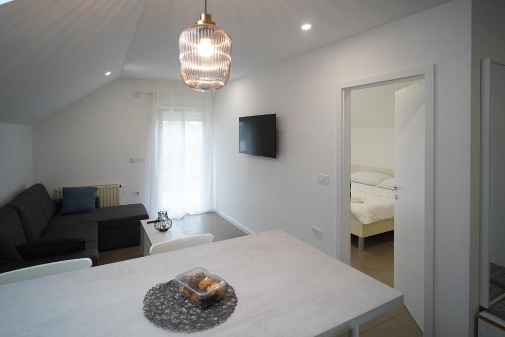Postel nebo postele na pokoji v ubytování Apartments Choice