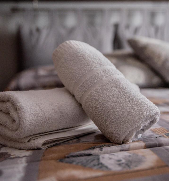 Łóżko lub łóżka w pokoju w obiekcie Agriturismo le due querce