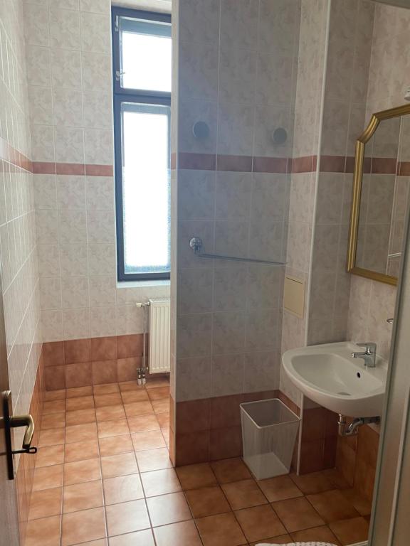 Koupelna v ubytování Penzión TATRA INN