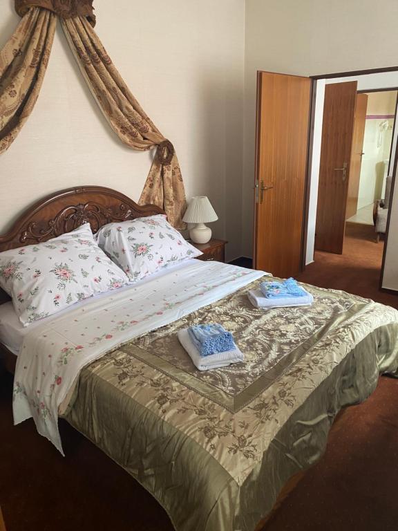 Postel nebo postele na pokoji v ubytování Penzión TATRA INN