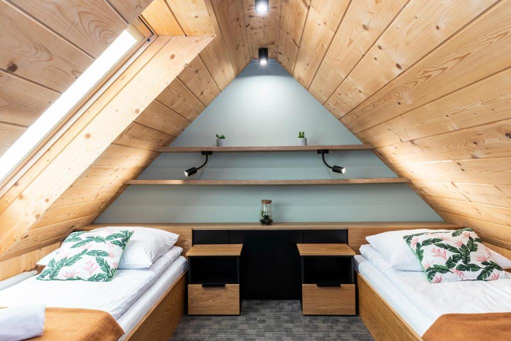 Posteľ alebo postele v izbe v ubytovaní Apartament Czorsztyn 2