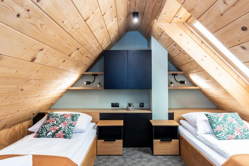 Posteľ alebo postele v izbe v ubytovaní Apartament Czorsztyn 2