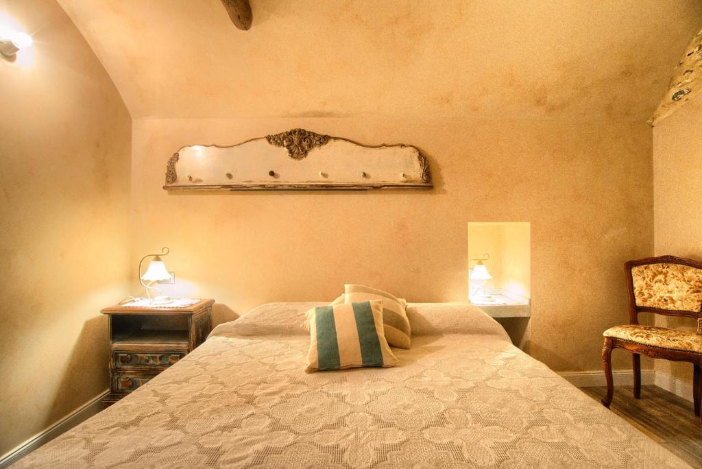 Postel nebo postele na pokoji v ubytování Casa Cannella con AC e wifi in borgo ligure