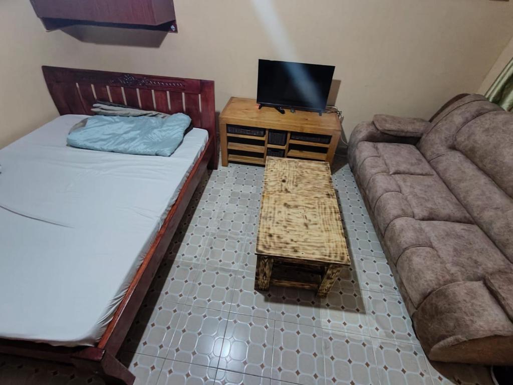 Postel nebo postele na pokoji v ubytování Ella's Haven