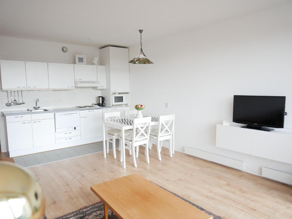Kuchyň nebo kuchyňský kout v ubytování Badhotel Appartementen Callantsoog