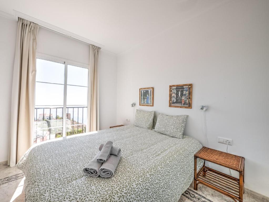Posteľ alebo postele v izbe v ubytovaní Amazing villa with magical view and pool in Nerja