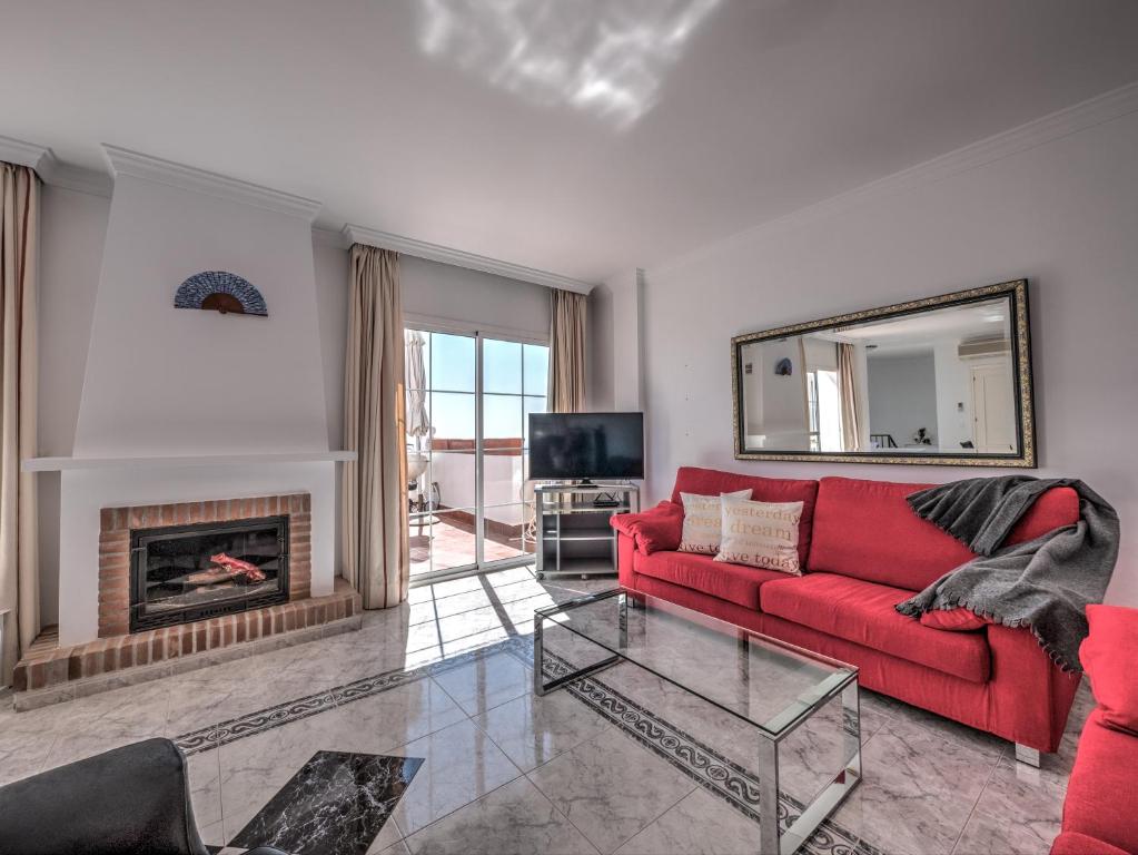 Posedenie v ubytovaní Amazing villa with magical view and pool in Nerja
