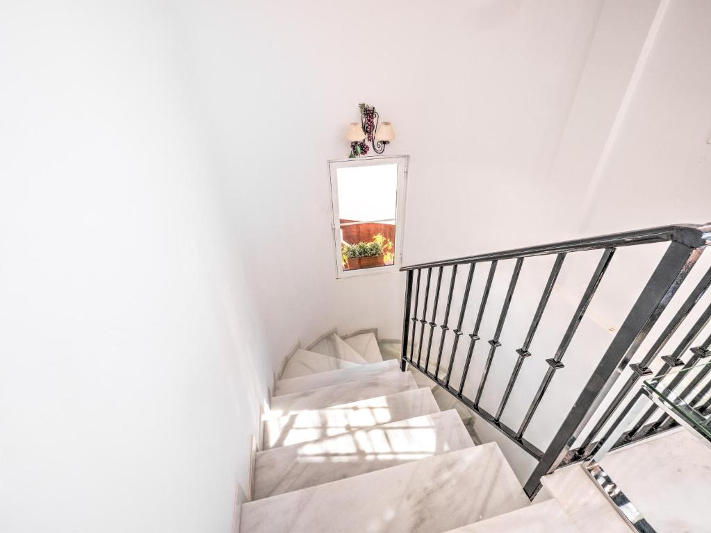 Posteľ alebo postele v izbe v ubytovaní Amazing villa with magical view and pool in Nerja