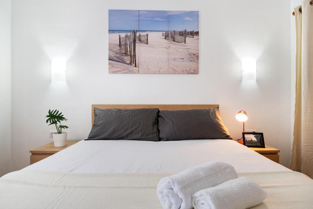 Posteľ alebo postele v izbe v ubytovaní Casa Las Palmeras