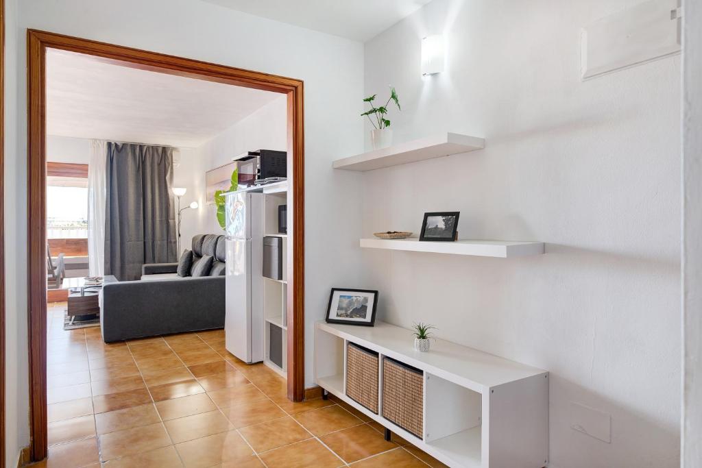 Posteľ alebo postele v izbe v ubytovaní Casa Las Palmeras