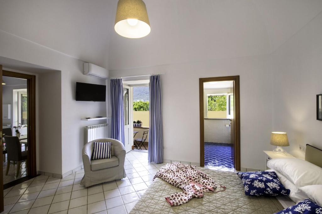 Postel nebo postele na pokoji v ubytování Casa Assunta B&B