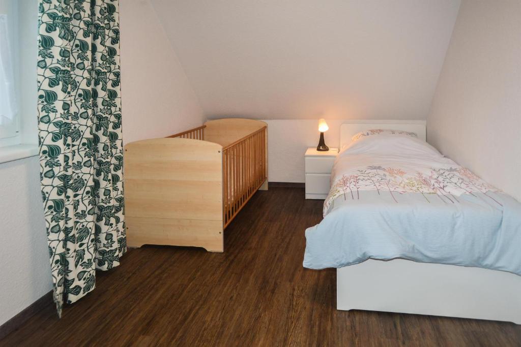 Postel nebo postele na pokoji v ubytování Ferienhaus Am Bienenzaun