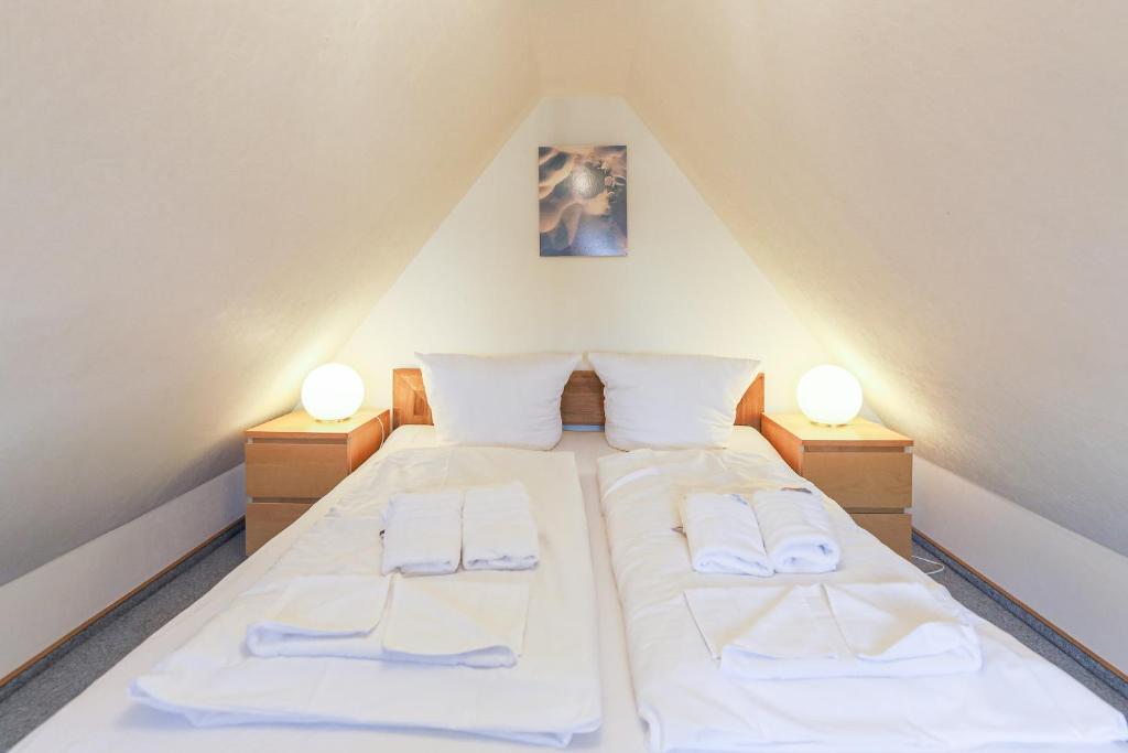 Postel nebo postele na pokoji v ubytování Appartement Wellenreiter