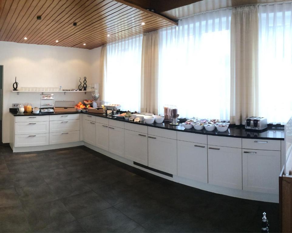 Kuchyň nebo kuchyňský kout v ubytování Hotel Leitner