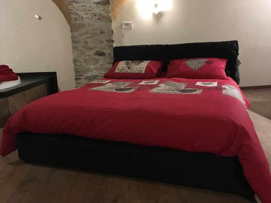 Postel nebo postele na pokoji v ubytování Lo Bòi Avise