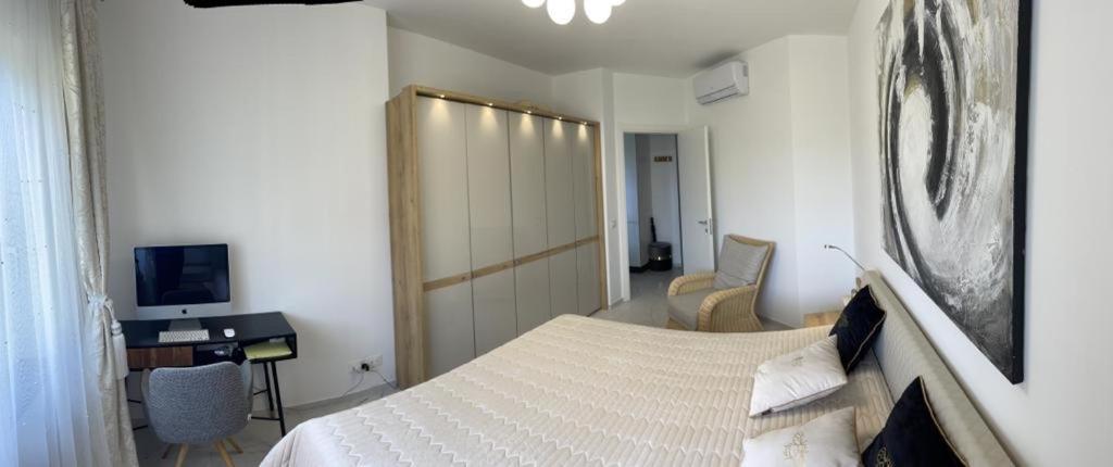 Televízia a/alebo spoločenská miestnosť v ubytovaní Luce del Sole