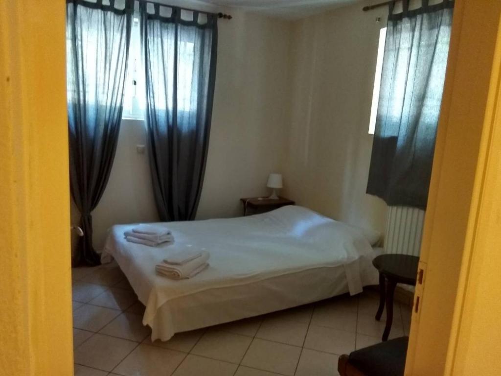 Posteľ alebo postele v izbe v ubytovaní Stavros Apartments