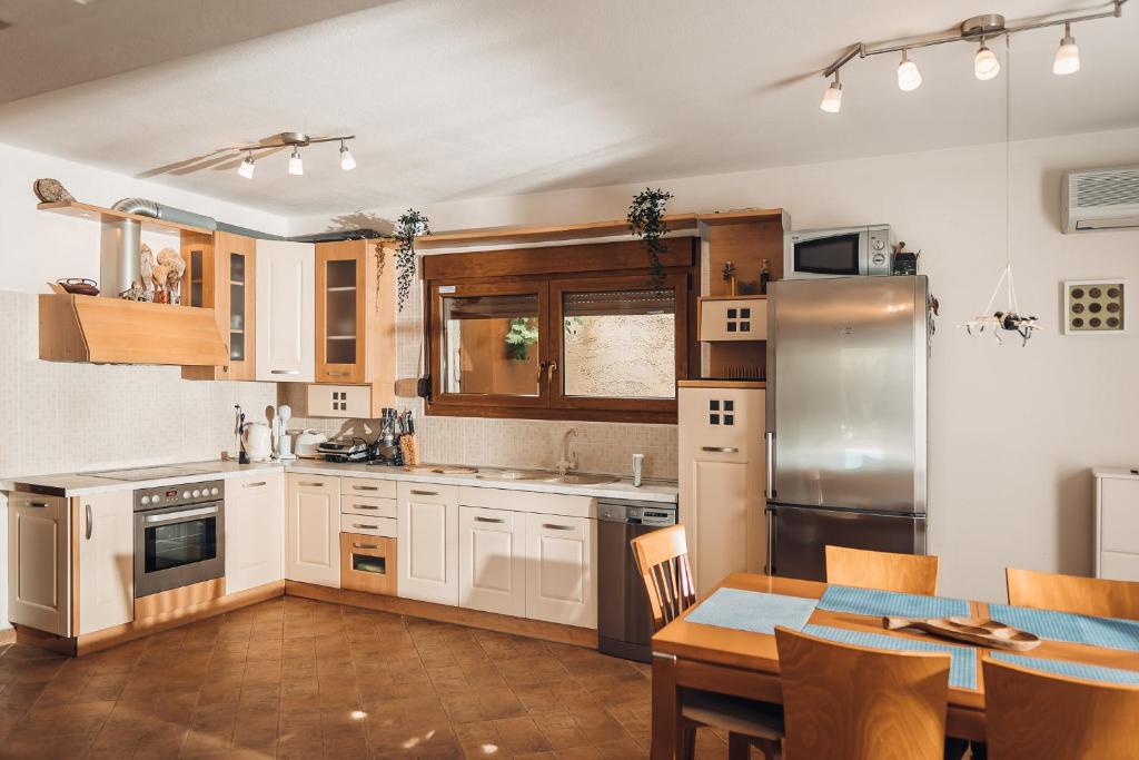 A kitchen or kitchenette at Private pool villa