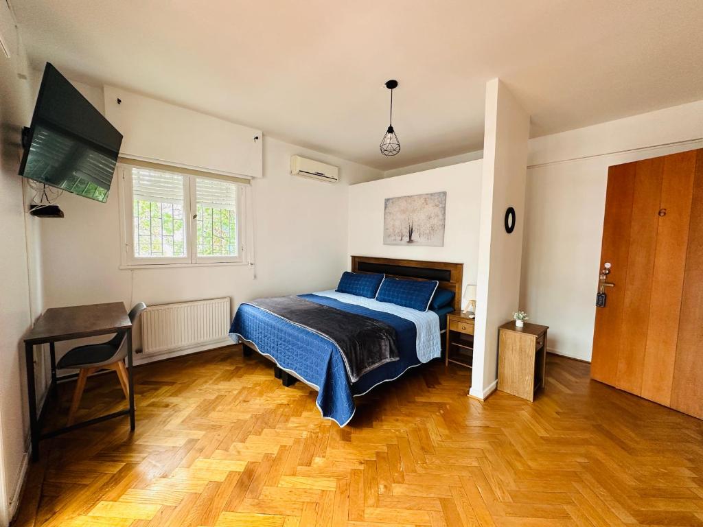 Postel nebo postele na pokoji v ubytování MAKTVB Europa - Hostal Boutique