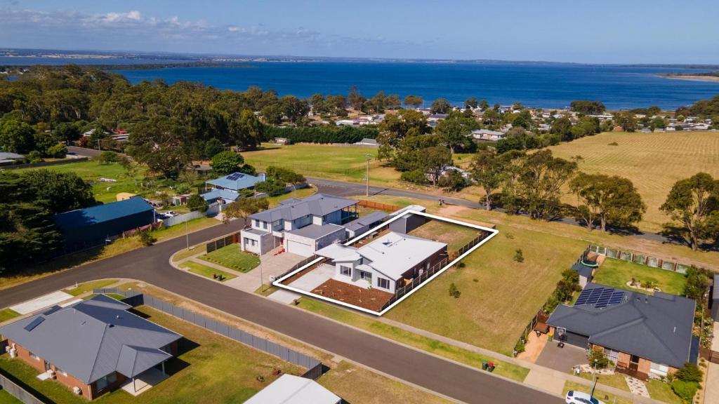 an aerial view of a house with a road at Aqua Views in Eagle Point