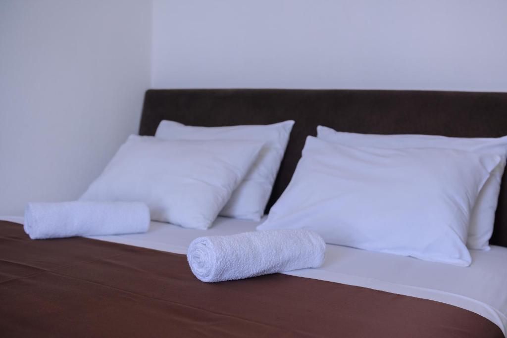 Postel nebo postele na pokoji v ubytování MS Hotel