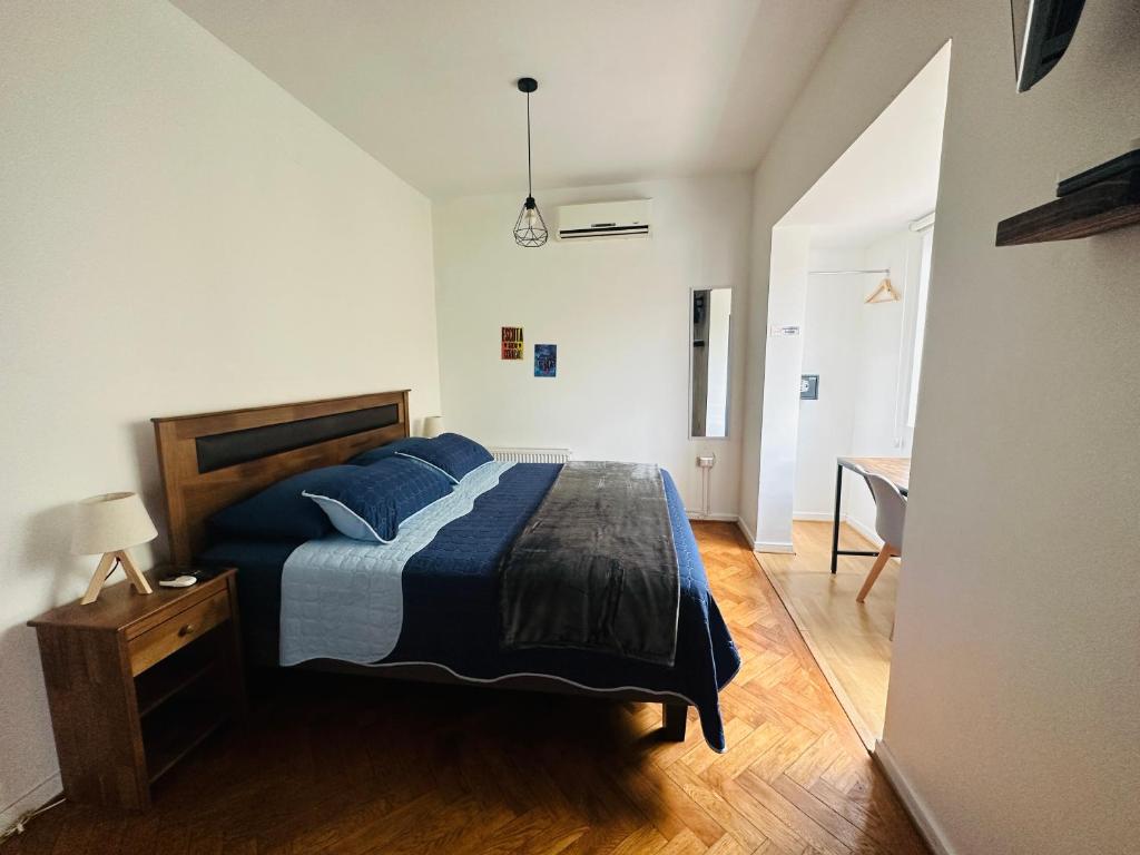 Postel nebo postele na pokoji v ubytování MAKTVB Europa - Hostal Boutique