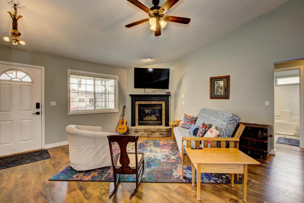 a living room with a couch and a fireplace at Hello Dolly! 3 beds, 2 bath, 2 TV's, Fireplace, Quiet Neighborhood in Star, ID minutes from walking trails and river views in Eagle