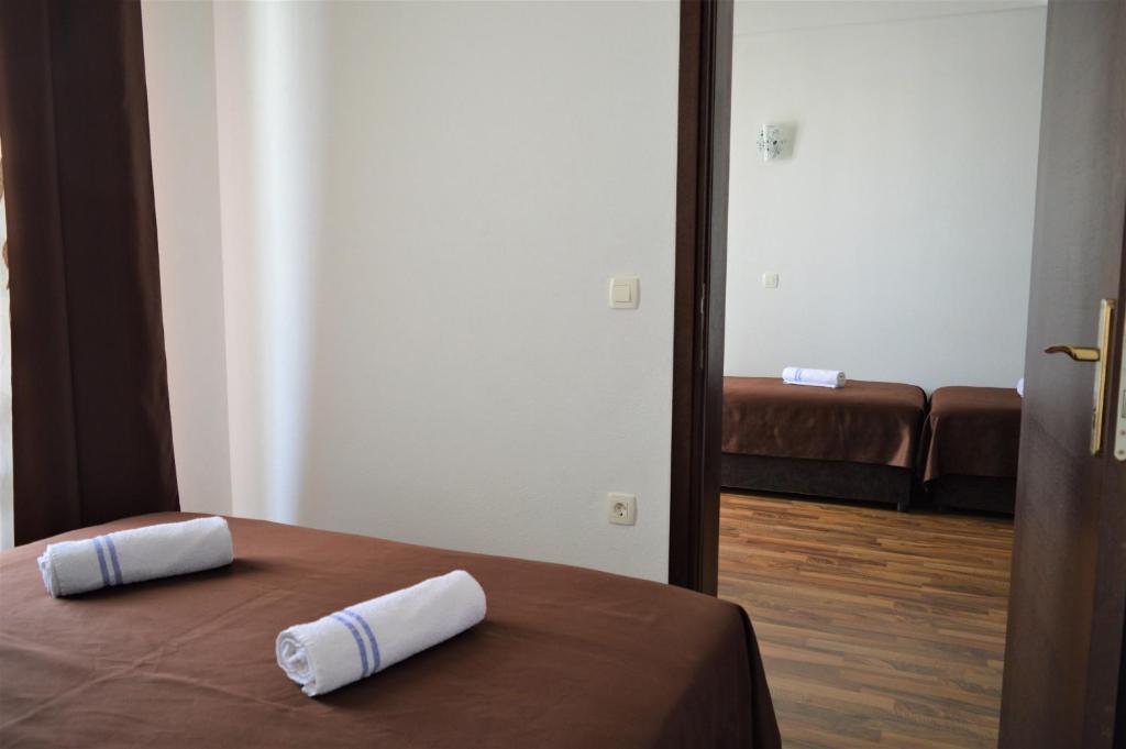 Postel nebo postele na pokoji v ubytování MS Hotel
