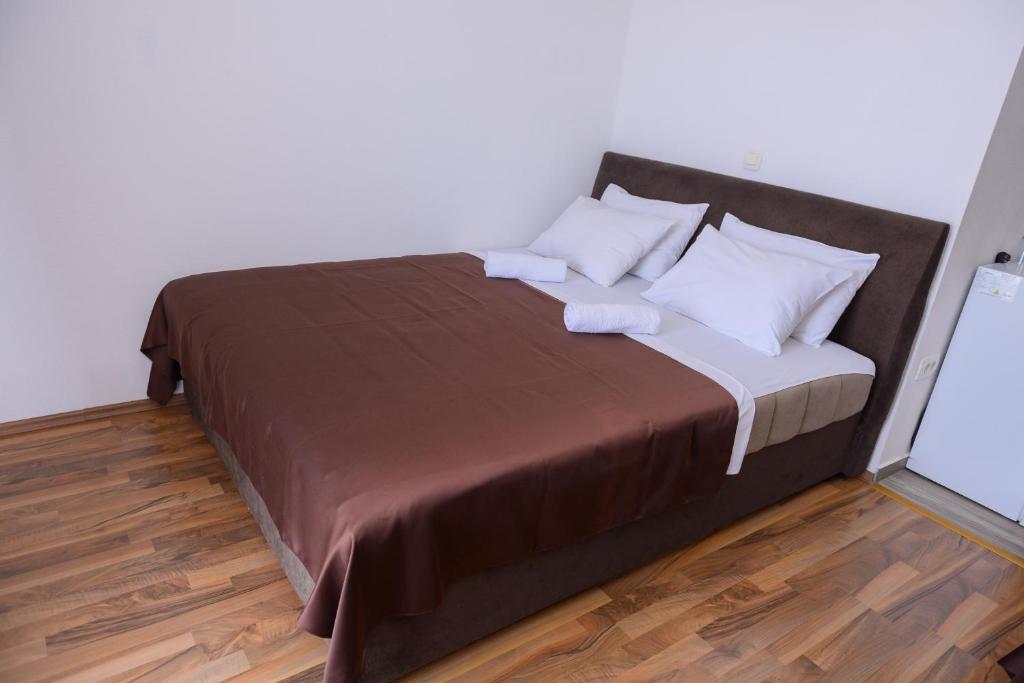 Postel nebo postele na pokoji v ubytování MS Hotel