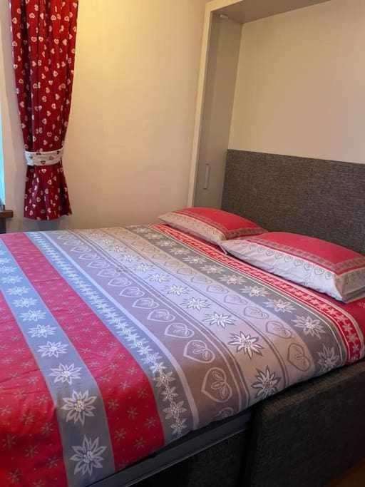 Postel nebo postele na pokoji v ubytování La Borna Morgex