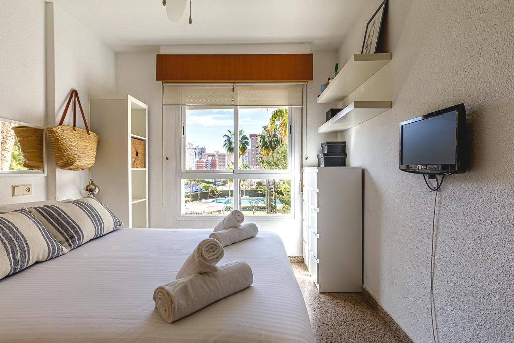 TV a/nebo společenská místnost v ubytování Apartamento con piscina y parking - Playa San Juan