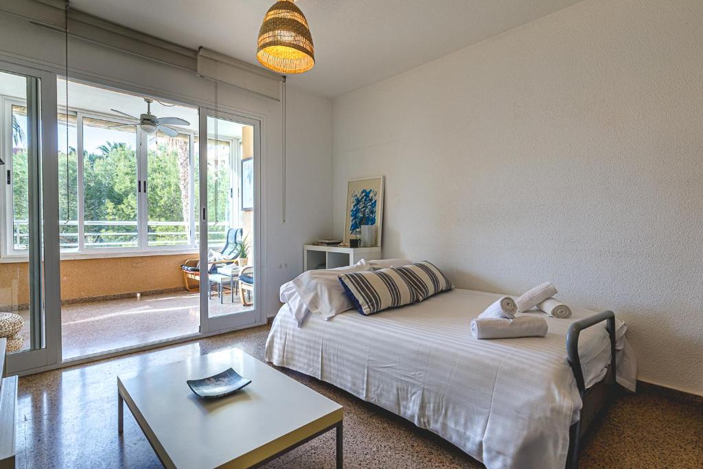 Postel nebo postele na pokoji v ubytování Apartamento con piscina y parking - Playa San Juan