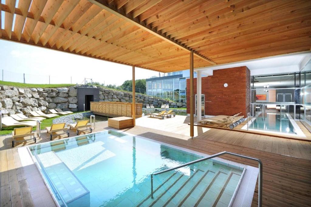 Bazén v ubytování Golf & Relax Apartment mit 4*S-Anbindung nebo v jeho okolí