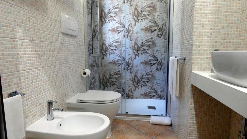 Koupelna v ubytování Hotel Piscina La Suite