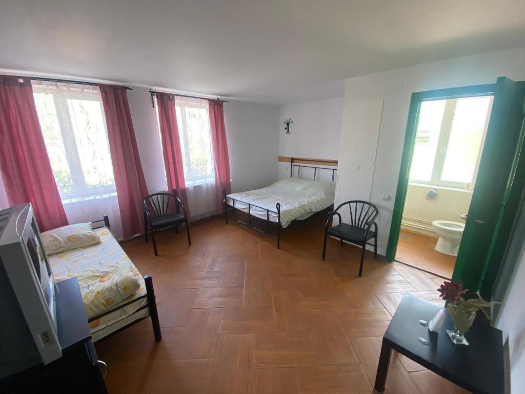 Fotografie z fotogalerie ubytování Pensiunea Sub Stejari Bănești ! Self Service ! Self Check-in! v destinaci Băneşti