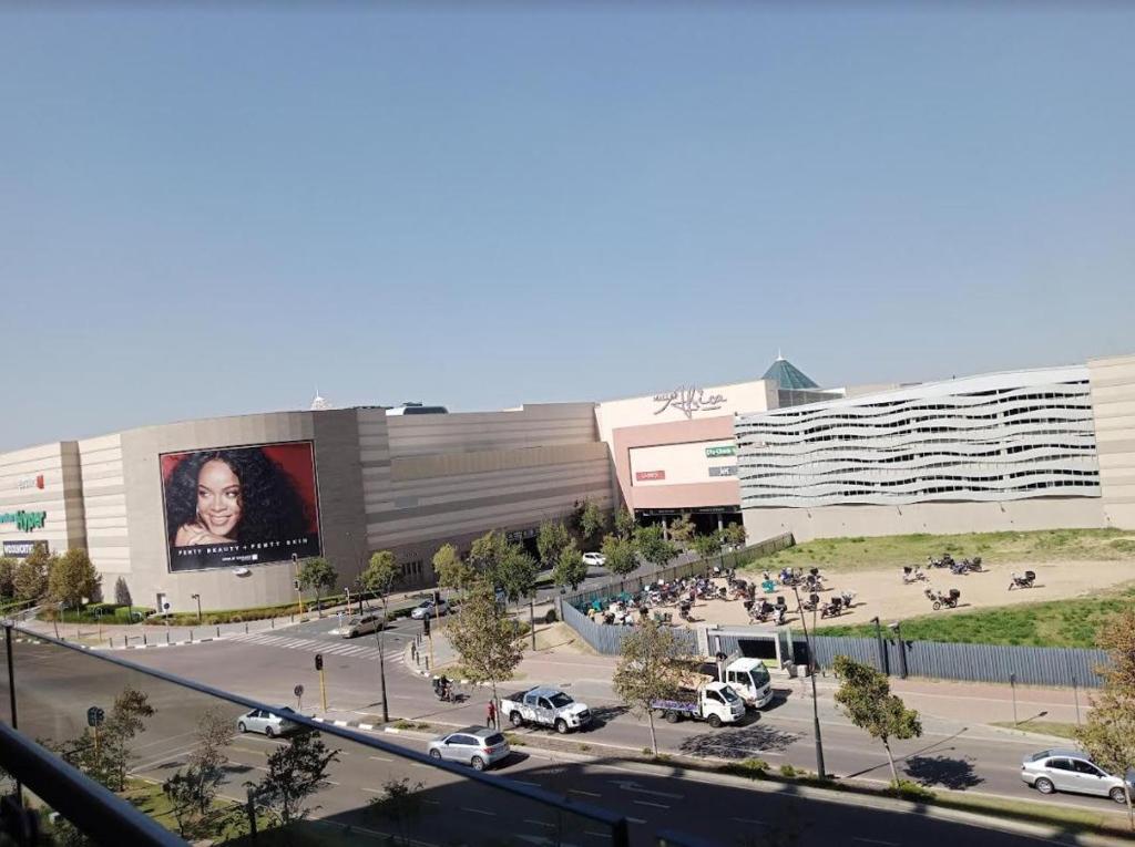 a rendering of a parking lot in front of a building at Executive Suite at Ellipse in Waterfall Midrand in Midrand