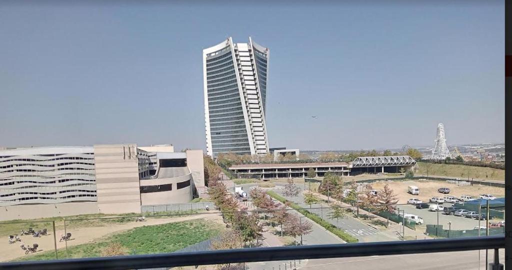 a view of a large building with a parking lot at Executive Suite at Ellipse in Waterfall Midrand in Midrand