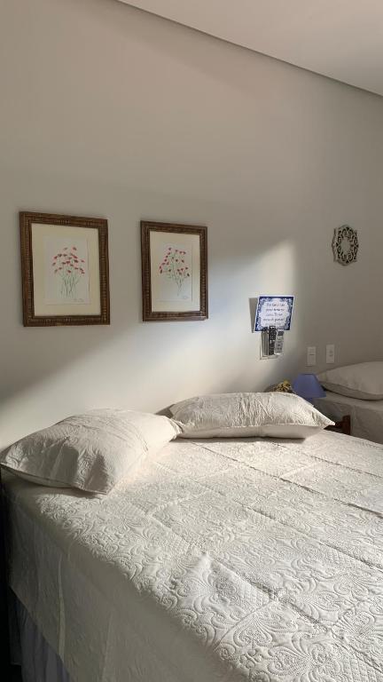 Postel nebo postele na pokoji v ubytování Recanto de Flor