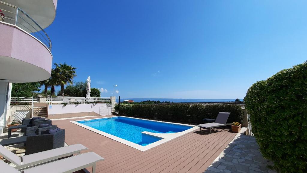 Πισίνα στο ή κοντά στο SEA VIEW- spacious apartment with shared pool