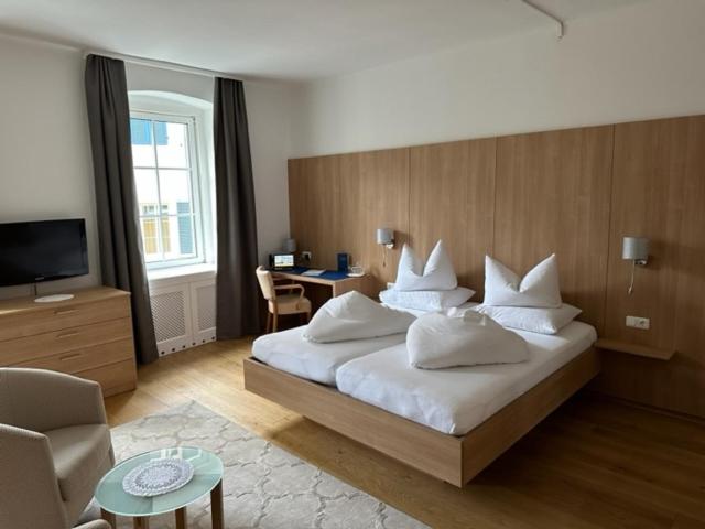 Postel nebo postele na pokoji v ubytování Hotel Kendler