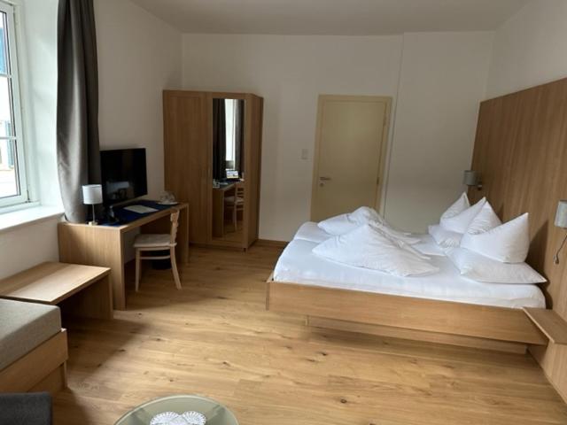 Postel nebo postele na pokoji v ubytování Hotel Kendler
